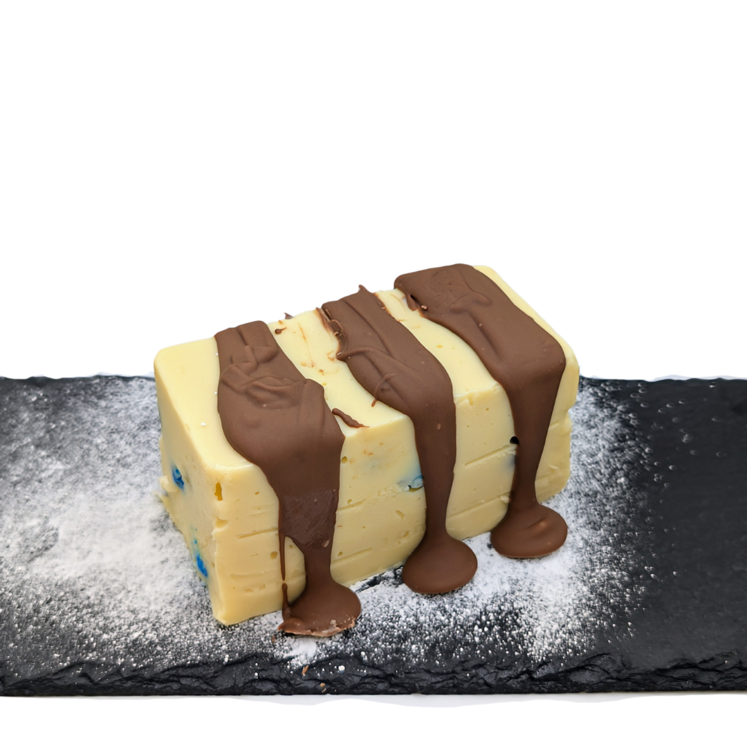 Satisfy your sweet tooth with mouth-watering M&M fudge – Pure chocolate bliss!